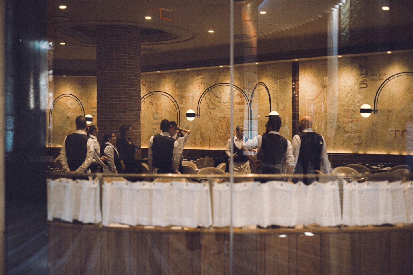 staff member serving drinks at an event